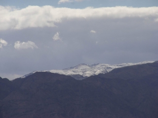 Snowy peak peeking among Edom mountains, 2013