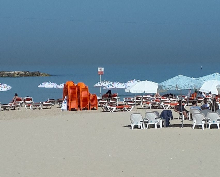 Relaxed beach scene. Tel Aviv.