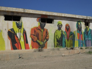 African figures. Mural. Old Jordanian Army Base. Kalia