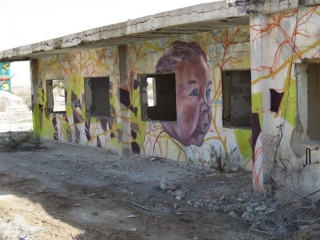 Libre, Mexican muralist. Israeli baby from Kalya. Gallery Minus 430.