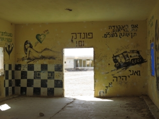 Soldiers graffiti on walls. Kalya Beach.