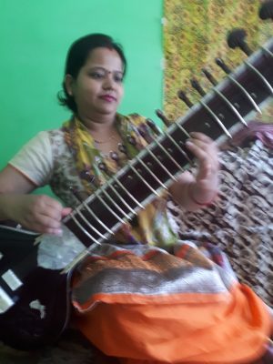 Nidhee, my singing teacher on her sitar. Bhagsu, Himachal Pradesh