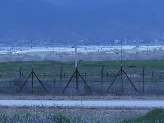 border-fences-and-the-other-side Border fences and the Jordanian side.