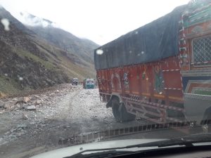 Colorful Himalayan trucks on road from Jispa to Leh