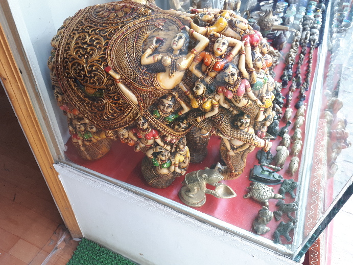 An extraordinary elephant decorated with asparas displayed in shopwindow in Leh