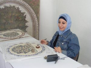 Mosaic artisan creating a piece. Jordan.