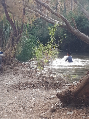 A boy enjoying the water at Einot Tzukim pool A boy enjoying the water at Einot Tzukim pool
