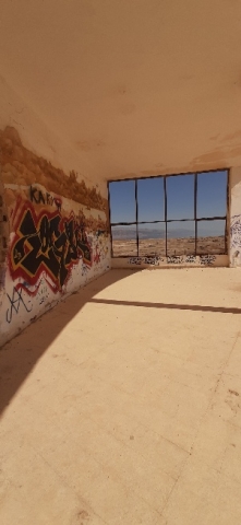 Graffity at Lido's abandoned army base with window view Graffity at Lido's abandoned army base with window view