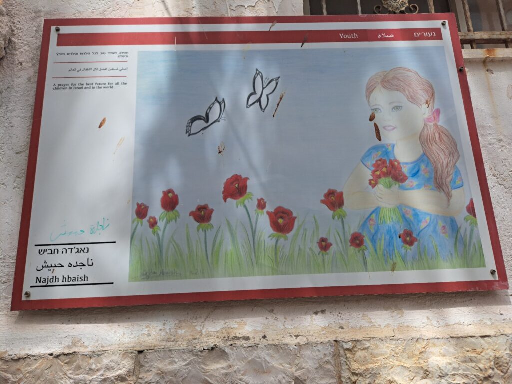 Prayer for the children by Najda Habish, in the Druze women alley at Yarka