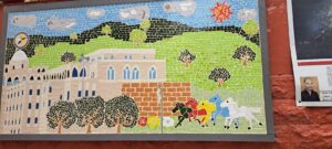 On the street in Yarka, a naive depiction of village life