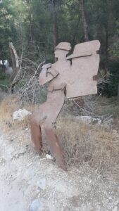 The Serpentine, Burma Road. model of soldier carrying the "sand ladders" for vehicle traction in 1948